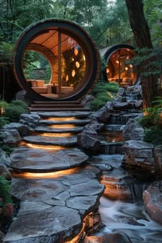 an outdoor living area with stone steps leading up to the door and water running through it