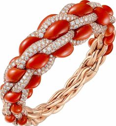 Tressage Bracelet, Cartier Libre:  Rose gold (750/1000), coral beads, coral and onyx motifs, brilliant-cut diamonds.​ Bracelet Cartier, International Jewelry, Mom Jewelry, Gold Flakes, Diamonds And Gold, Coral Beads, Black Stone, Fashion Stylist