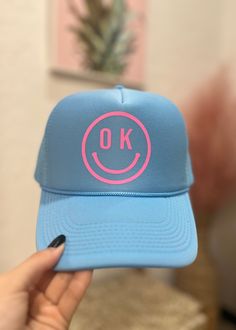 When you are running behind because your little one isn't cooperating with your schedule, we've got you! You can still go out and about in style with this OK smiley trucker hat! Hats My Madi Blue With Pink Made in Oklahoma Pink Hat, Out And About, Oklahoma, Smiley, Trucker Hat, Little One, Going Out, In Style, Running