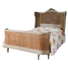 an old fashioned bed with wicker headboard and foot board