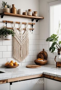 a kitchen with white tile and wooden shelves