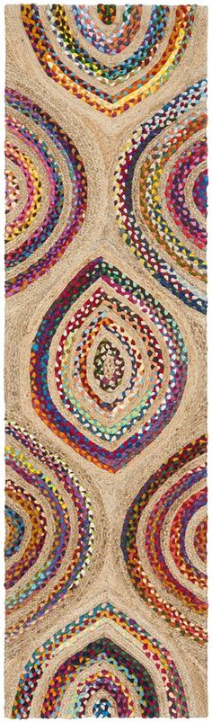 a multicolored rug with circles on it