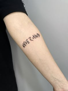 a woman's arm with the word westland written in cursive font