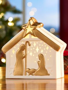 a christmas nativity scene with a star on top