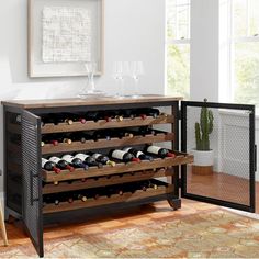 a wine rack with several bottles in it