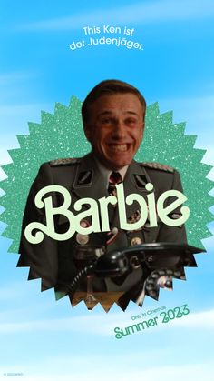 a man in uniform is smiling and holding a tabletop with the words barbie on it