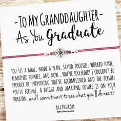 a card with a message on it that says, to my granddaughter as you graduate