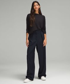 Looking Sharp. These High-Rise Trousers Have Front Pleats And Tailored Details For A Classic Look That Means Business. Designed For Casual. 32.5" Inseam, Intended To Skim The Floor For Heights Of 55"-58":relaxed Fit Is Roomy Through Glutes And Thighs. Hand Pockets With Hidden Card Sleeve. Back Welt Pockets Are Stitched Closed-Snip The Stitches To Make The Pockets Functional. Fly Front. | Pleat-Front High-Rise Trouser Regular