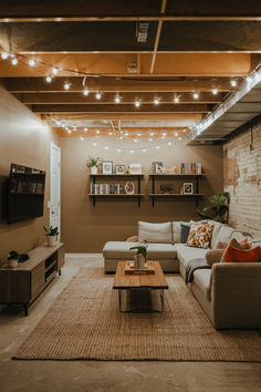 a living room filled with furniture and a flat screen tv mounted on a wall above a wooden coffee table