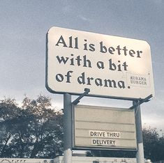 a sign that says, all is better with a bit of drama