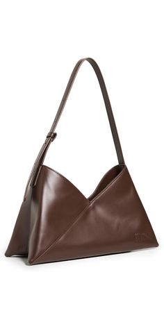 Find MAISON MARGIELA Japanese 6 Soft Baguette on Editorialist. Calfskin. Magnetic snap at top. Patch interior pocket. Adjustable strap. Textile lining. Weight: 12oz / 0.34kg. Imported, Bulgaria. Measurements: Height: 7.75in / 20cm Length: 12.5in / 32cm Depth: 4.25in / 11cm Handle drop: 11in / 28cm Margiela Bag, French Roast, Mm6 Maison Margiela, Bulgaria, Cotton Twill, Patch Pocket, Calf Skin, Women Handbags, Adjustable Straps