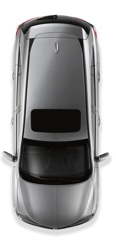 an overhead view of a silver car on a white background