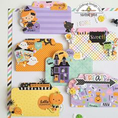 many different types of halloween cards on a white surface