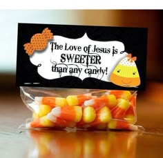 there is a candy bag that has some candy in it and the label says, the love of jesus is sweeter than any candy