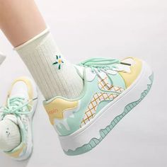 These sneakers feature a playful ice cream-inspired design with pastel colors arranged in a grid pattern, highlighted by whimsical drips and wavy soles for a fun and youthful look. Material: Vegan Leather Run small, please review the sizing information Cute Spring Sneakers, Sailor Moon Custom Shoes, Cute Roller Blades, Colorful Sneakers Ideas, Pastel Core Outfits, City Pop Fashion, Kawaii Shoes Sneakers, Grunge Aesthetic Shoes, Cute Platform Sneakers