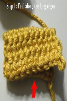 the crochet hook is shown with an arrow pointing to it