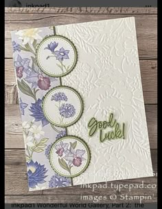 a close up of a greeting card with flowers on it and the words good luck