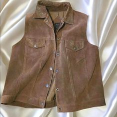 You will love this vintage agapo western vest in size 2XL. It's comfortable in the warmer months and makes a a stylish Layered addition during the colder seasons. Please look closely at all pictures. This item is lightly loved but has no obvious signs of wear and tear ! Please message me if you have any questions. DM Me your best offer if I am running a special I might be able to accommodate you! Thanks gorgeous Western Vest, Womens Jackets, Leather Vest, Custom Embroidery, Coats Jackets Women, Womens Vest, Western Fashion, Vintage Collection, Vest Jacket