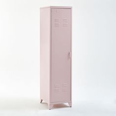 a pink locker sitting on top of a white floor