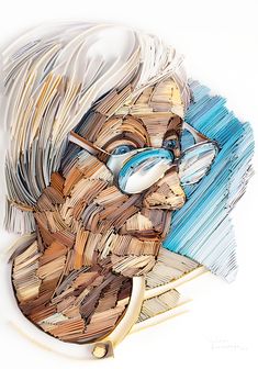 a drawing of a man's face made out of newspaper strips and paper machs