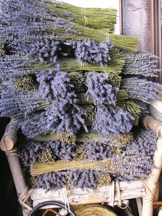 lavender flowers are stacked on top of each other