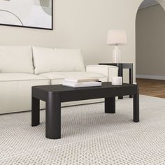 Elevate your living space with our Contour Rectangular Coffee Table, designed to blend style and practicality. Crafted meticulously from solid pine wood, this modern coffee table for living room ensures both durability and timeless elegance. Its use of non-toxic finishes not only ensures a safe environment but also reflects a commitment to eco-conscious craftsmanship. Its unique, modern rounded edges add a stylish touch to the piece while easing flow of movement in your living space, making it a Living Room Black Coffee Table, Black Coffee Table, Coffee Table For Living Room, Living Room Black, Table For Small Space, Table For Living Room, Coffee Table Rectangle, Black Coffee Tables, Large Coffee Tables