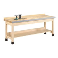 a workbench with tools on the top