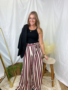 Burgundy Striped Pleated Self Tie Palazzo Pants Some stretch in the waist. Kenzie is wearing the medium (typically wears a small) 100% polyester Tie Pants, Palazzo Pants, Striped Pants, Wine, Boutique, Pants, Pink, How To Wear, Fashion Tips