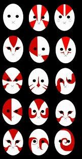 several circular red and white designs on a black background, each with different face shapes