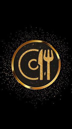 a black and gold plate with a fork and knife in the center that says ct