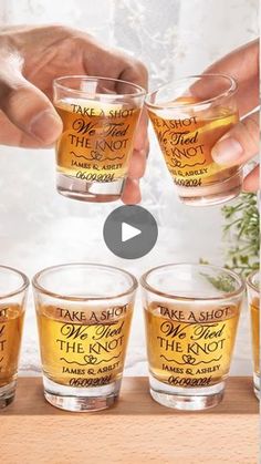 someone is holding their shot glasses with the words take a shot, and they're not