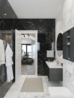 a bathroom with black and white marble walls