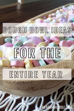 a bowl filled with marshmallows on top of a table