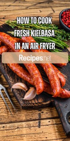 sausages on a cutting board with knife and peppercorst in the background text reads how to cook fresh kielbasa in an air fryer