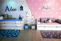 a baby's room is decorated in pink and white with hearts on the wall