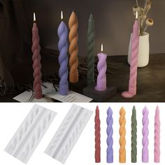 five candles are lined up next to each other in different colors and sizes, along with the candle holders