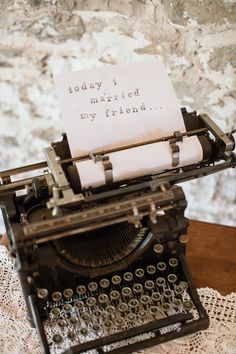 an old fashioned typewriter with a note on it that says today i married my friend