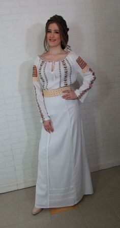 This dress, decorated with traditional romanian motifs is  made from linen fabric and decorated with silk thread machine embroidery.  The dress is made of 2 pieces, skirt and blouse, which can be worn separately   Dress is made to order according to the size indicated by you. Please indicate following measures: Bust line- Waist line- Hips line- Dress length from waist- in inch or in cm.  Are the points  2, 4, 5, 6 in the measuring guide. (you can find it in pictures) For the custom made dress it Peasant-style Embroidered Dress For Festival, Peasant Style Embroidered Dress For Festival, Bohemian White Embroidered Dress With Woven Motifs, White Bohemian Embroidered Dress With Woven Motifs, White Folk Embroidered Dress With Woven Motifs, Folk Style Embroidered Dress For Traditional Ceremonies, Folk Style White Embroidered Dress For Traditional Ceremonies, White Folk Embroidered Dress For Traditional Ceremonies, Folk Style Fitted Embroidered Dress