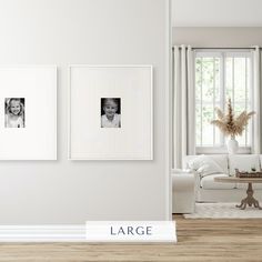 a living room with white furniture and pictures on the wall above it that says large