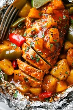 chicken with pineapples, peppers and jalapenos in foil