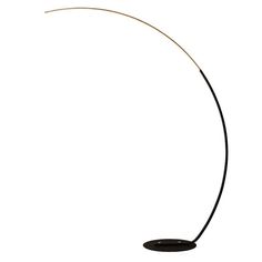 a floor lamp with a black base and a white light on it's side