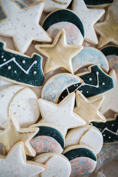 decorated cookies in the shape of stars and crescents