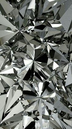 an image of many shiny objects that are in the shape of a cube or pyramid