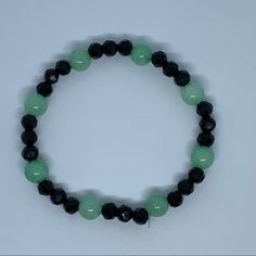 Cute Mint Quartzite Crystal Stone Bracelet With Black Beads, Stretchy String So Can Easily Be Taken Off And Put Back On, Handmade By Me, Super Vibrant Color, New - Never Worn! Ships Same/Next Day! Green Glass Bead Bracelet, Casual Black Crystal Bracelet With Round Beads, Elegant Handmade Black Stretch Bracelet, Bracelet With Black Beads, Letter Bead Bracelet, Crystal Stone Bracelet, Buddhism Wallpaper, Bracelet Business, Letter Bead Bracelets