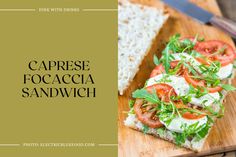 caprese focaccia sandwich with tomatoes and lettuce on toasted bread