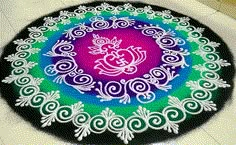 a colorful rangdi design on the ground