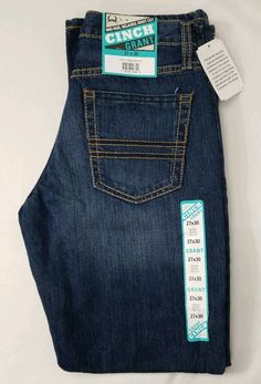 NWT. Cinch Grant Jeans size 27 x 30 LOOKIN FOR THE GOOD STUFF? WE GOT THE GOOD STUFF! Western and Work related clothing in men's and women's. Brand new hard-to-finds, close-outs, and carefully inspected irregulars. Random sizes, patterns, and colors. Name brands you know like Carhartt, Ariat, Cinch, Wrangler and Dickies. REAL pictures of IN STOCK items that are ready to ship! Most orders are in your mailbox in 3 business days with FREE SHIPPING! Inventory changes quickly, never know what will po Colors Name, Cinch Jeans, Real Pictures, Mailbox, Brand You, The Good, Levi Jeans, Jeans Size, Free Shipping