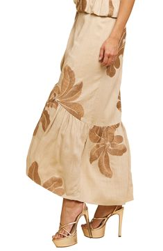 Fall for the wrapped silhouette of this lightweight linen-kissed skirt trimmed with fanciful frills. 39 1/2" length True wrap style with side tie closure Lined 85% rayon, 15% linen Hand wash, dry flat Imported Asian & Pacific Islander Owned/Founded Spring Linen Bottoms With Ruffle Hem, Beige Flowy Skirt With Ruffle Hem, Beige Tiered Skirt With Ruffle Hem, Ruffled Linen Beach Bottoms, Ruffled Linen Bottoms For Beach, Long Linen Ruffled Skirt, Ruffled Linen Bottoms For The Beach, Chic Linen Ruffled Skirt, Chic Linen Ruffled Skirt Bottoms