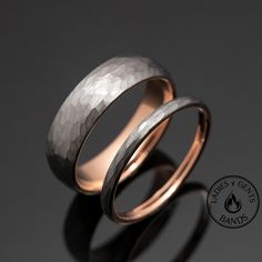 two wedding bands made out of silver and rose gold