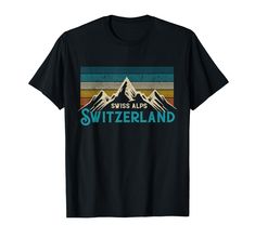 a black t - shirt with the words swiss alps switzerland in front of mountains and trees